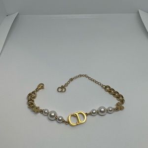 Christian Dior Gold Pearl braclet